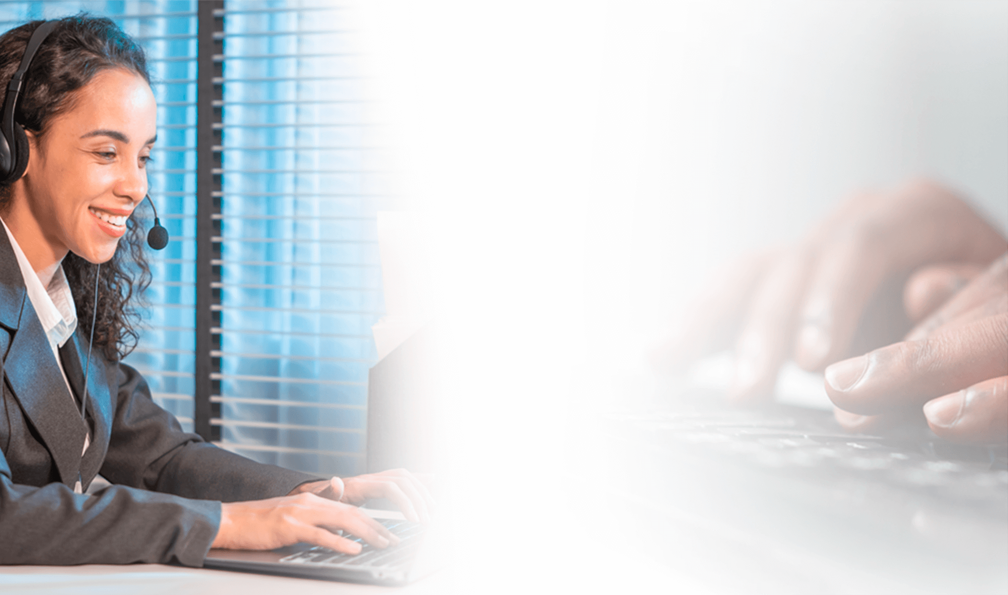 Call Center Representative with headset and hands typing on a keyboard