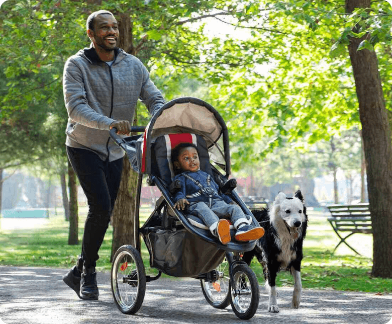 Image of a man with child in stroller