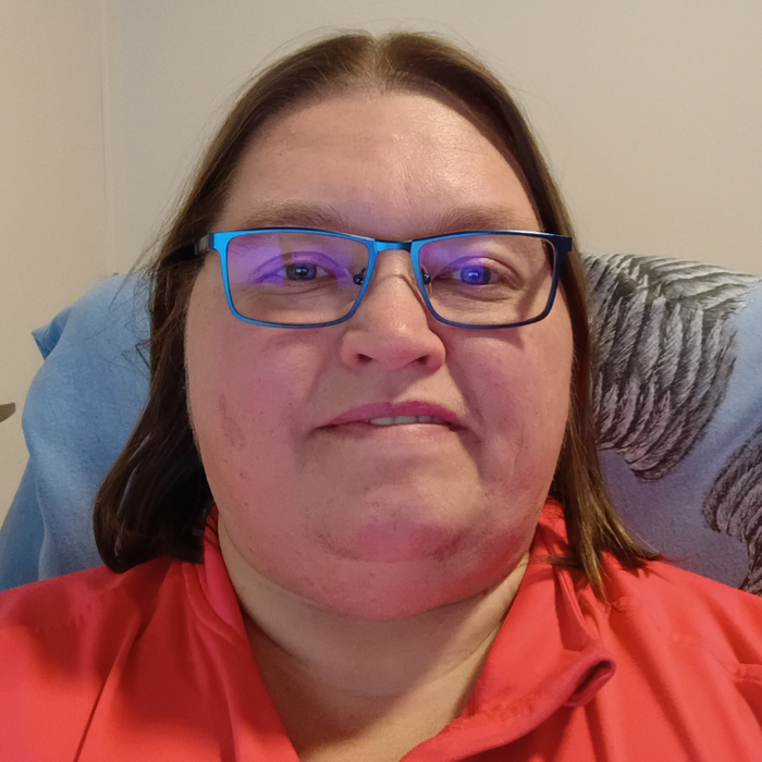 Lucy, VYEPTI® patient, taking a selfie.